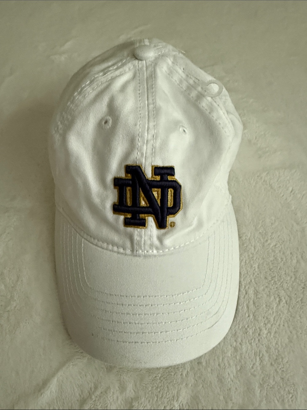 Legacy White Baseball Cap with Navy & Gold Notre Dame Logo